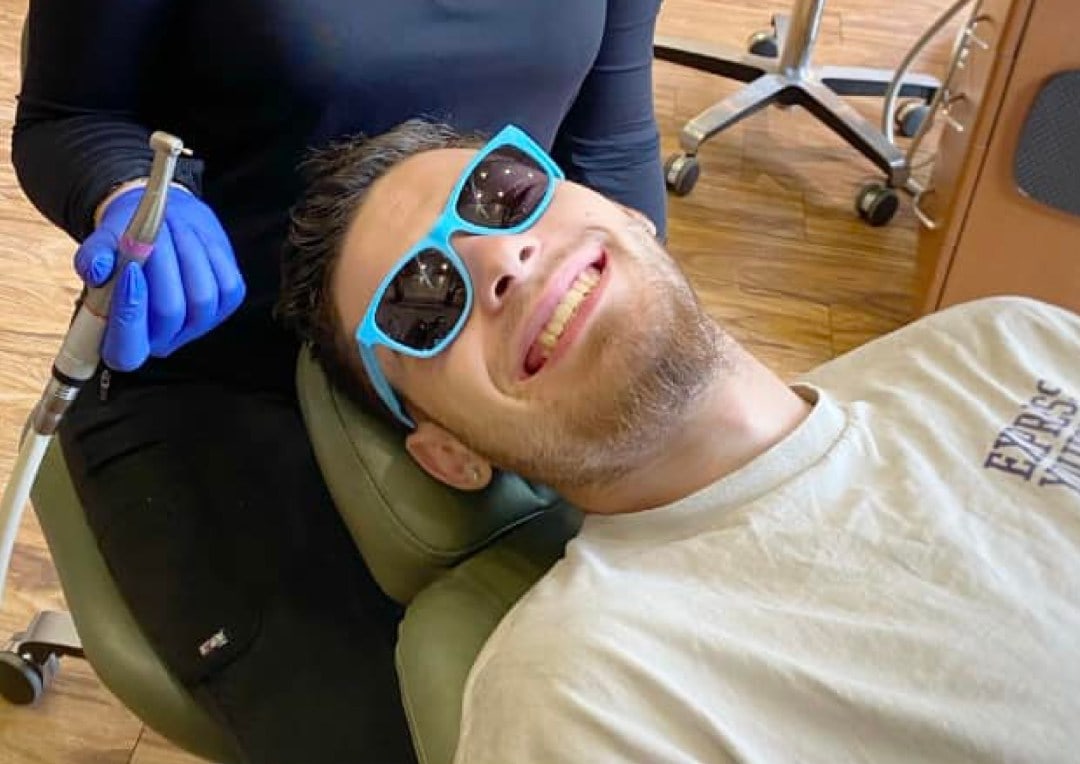 Happy patient in chair